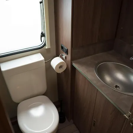 Punta Falconera & Village