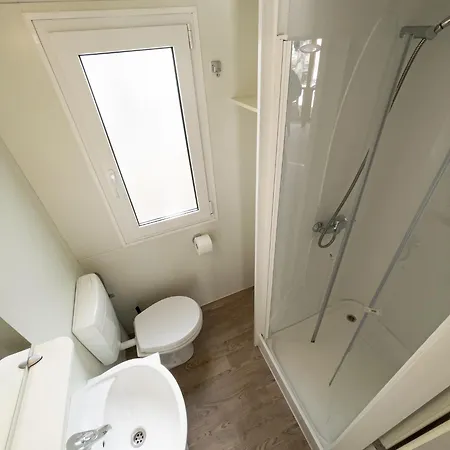 Punta Falconera & Village