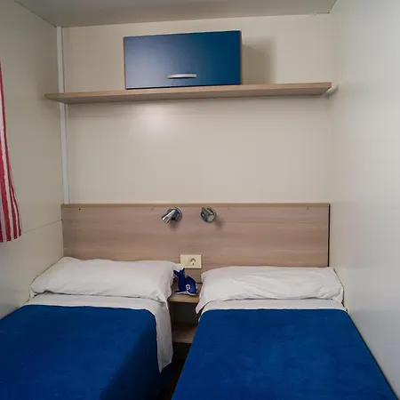 Punta Falconera & Village